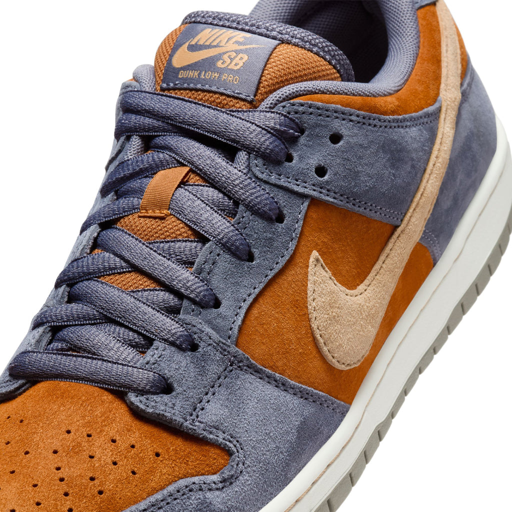 Nike SB Nike SB Dunk Low Pro
LIGHT CARBON/SESAME-MONARCH-SUMMIT WHITE H306-002 detail